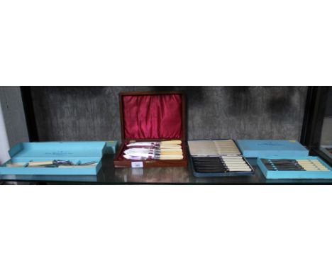 An assortment of silver plated cased flatware, to include a set of six fish knives and forks in a mahogany case, six scone kn