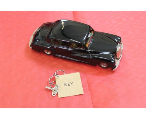 A German tinplate Neuhierl (JNF) clockwork Mercedes-Benz 300 'Adenauer' saloon car in black with lithographed interior, steer