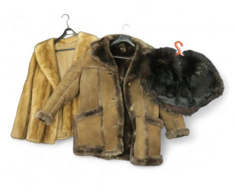 A fox fur shrug, a sheepskin coat and a fur coat Condition Report:No condition report available.