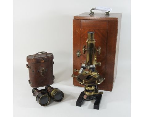 A mid 20th century Carl Zeiss Jena brass cased microscope, no. 63504, 34cm high, together with a pair of early 20th century b
