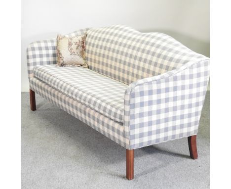 A modern grey and white check upholstered sofa, with a shaped back, 181cm