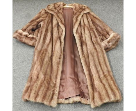 A ladies vintage fur coat