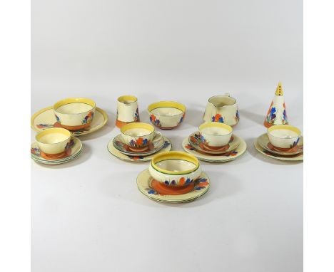 A Clarice Cliff Crocus pattern part tea service, to include a sugar conical sugar sifter, 14cm high, and a milk jug
