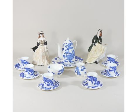 A Coalport blue and white coffee set, decorated with a dragon design, together two Royal Worcester figures, Knightsbridge and