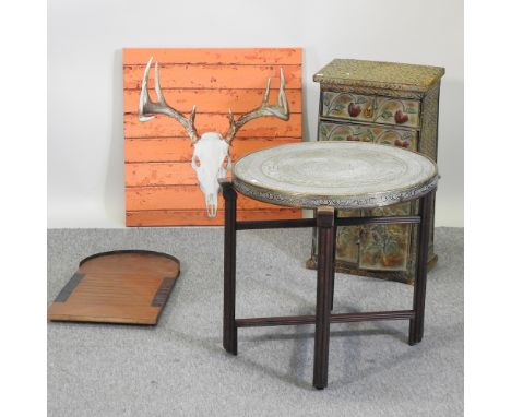 A painted metal chest, 41cm, together with a tin, a cribbage board, an Indian brass tray top table, and a print (5)