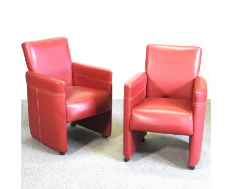 A pair of Art Deco style red upholstered armchairs