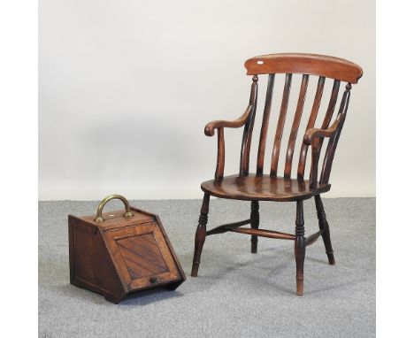 An early 20th century elm seated splat back armchair, together with an Edwardian oak coal purdonium, 30cm and a fire screen, 