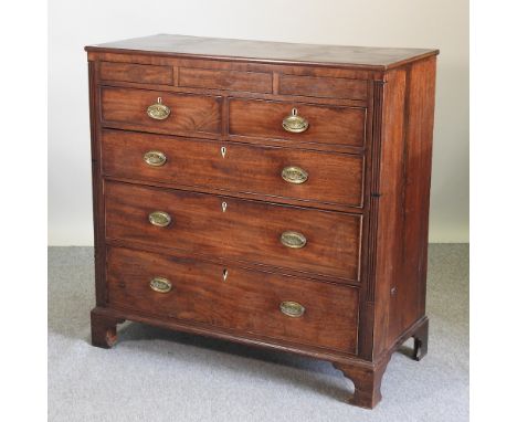 A late George III mahogany chest of drawers, on bracket feet, 118cm