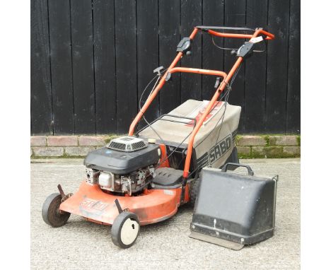 A Sabo petrol rotary lawn mower