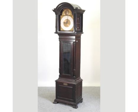 An early 20th century longcase clock, with a brass dial and three train movement, 226cm high