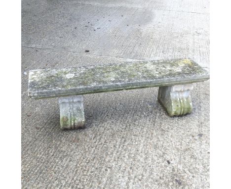 A reconstituted stone garden bench, 168cm