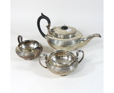 An Edwardian silver three piece tea service, London 1903, 1020g gross