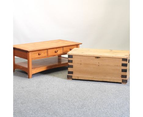 A 19th century metal bound pine trunk, 88cm, together with a pine coffee table