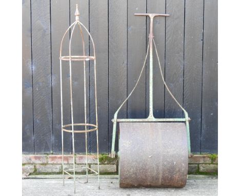 An iron garden spire, 142cm high, together with a garden roller (2)