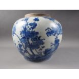 An Oriental porcelain blue and white jar with chrysanthemum and bird decoration, 10 1/2" high