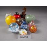 Ten fruit and vegetable shaped paperweights and ornaments, and a quantity of similar paperweights,