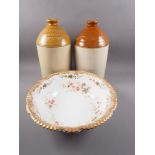 A pair of stoneware flagons, "Ansells Brewery Ltd, Aston Brewery, Birmingham", 16" high, an