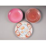 A Chinese sang de boeuf glazed dish with reverse, a Hua wave and acanthus leaf decoration, 8" dia, a