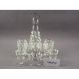 A late 20th century glass drinking set with grapevine decoration, thirty pieces approx, a Tuscan "