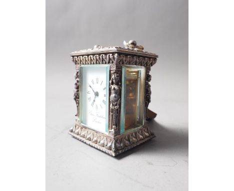 A commemorative Silver Jubilee miniature silver relief cased carriage clock by Charles Frodsham, London, with bevelled glass 