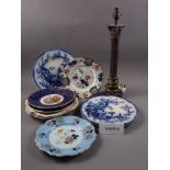 A pair of Limoges plates with central figure decoration and blue and gilt borders, 9" dia, two