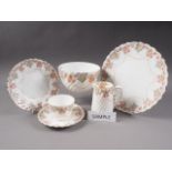 An Aynsley bone china floral and swag decorated part teaset