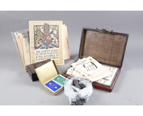 A reproduction Mah-jongg set, in a red lacquered box, two sets of dominoes, a set of playing cards, a quantity of Coronation 