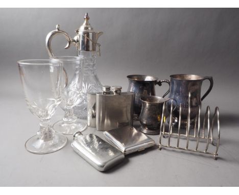 A cut-glass claret jug, with silver plated mounts, a plated "Claret" wine label, three plated tankards, three pewter spirit f