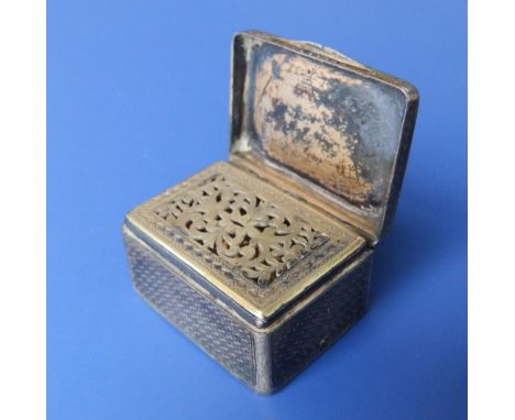 A George IV silver musical vinaigrette, having engine turned decoration to all sides, gilt interior, a concealed musical move