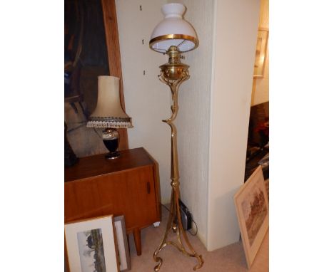 An art nouveau brass standard oil lamp, 71” overall.