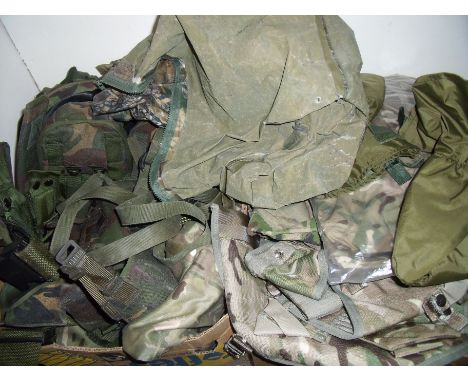 Two boxes containing a large quantity of British military army surplus including Combat 95, webbing, body armour, clothing et