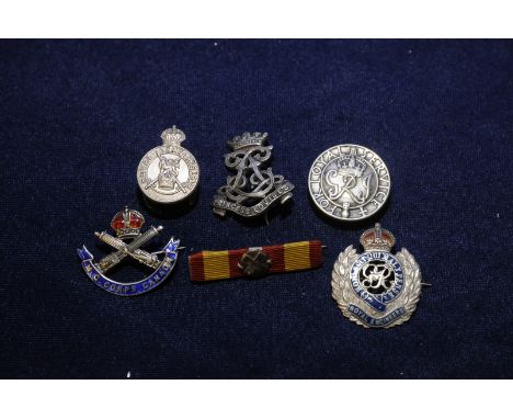 Selection of military lapel badges including Royal Army Reserve, silver and enamel Machine Gun Corp. Canada, Services Rendere