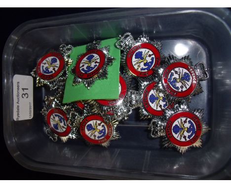 Fourteen stay bright and enamel Defence Fire Service Cap badges 