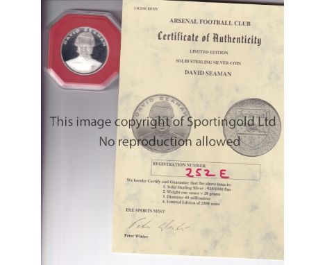 DAVID SEAMAN / ARSENAL     A commemorative medal in plastic casing and Certificate of Authenticity licensed by Arsenal FC wit