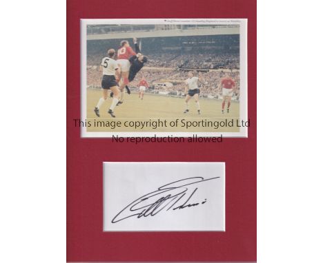 WORLD CUP 1966 GEOFF HURST     Mounted pictured of Geoff Hurst in action in the 1966 World Cup Final signed by the hat-trick 