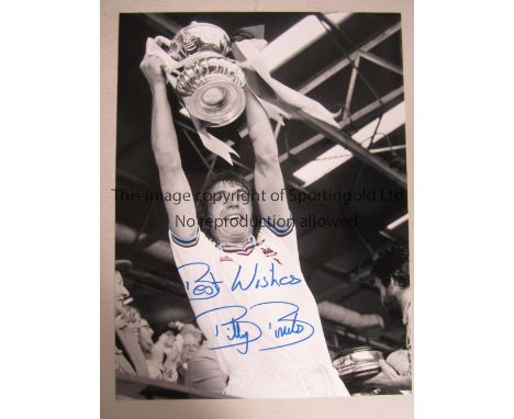 BILLY BONDS / WEST HAM UNITED    Colourized 16” x 12” showing Bonds holding aloft the FA Cup in 1975 signed with the inscript