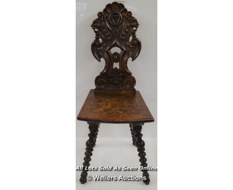 *19TH CENTURY ITALIAN RENAISSANCE INFLUENCED BLACK FOREST HALL CHAIR WITH GROTESQUE AND ACANTHUS CARVED PIERCED BACK AND ENGR