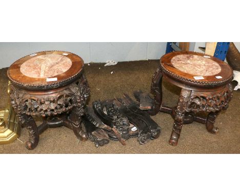 A Pair of Chinese Marble Topped Hardwood Stands, each on scroll supports with X frame cross stretcher, 35cm by 34cm; together