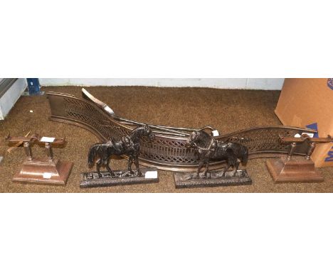 A George III Pierced Steel Bedroom Fire Fender, of serpentine form, a pair of similar andirons, set of fire tools, and a pair