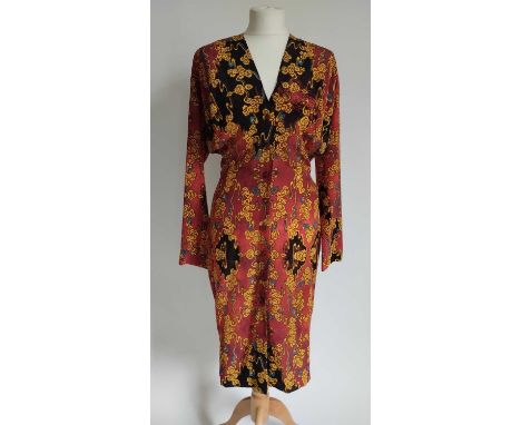 Vivienne Westwood Gold Label Silk Dress, on a red ground printed with yellow floral motifs overall, long sleeves, v-neckline,