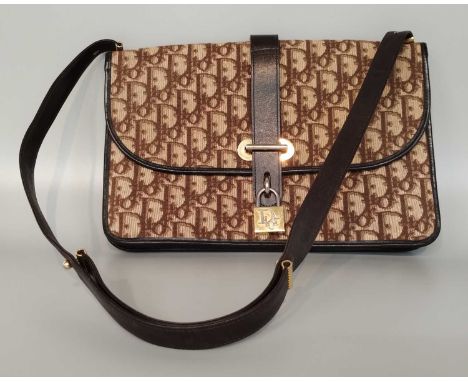 Christian Dior Brown Monogram Canvas Shoulder Bag with brown leather trims, shoulder strap, padlock closure, gilt-tone hardwa