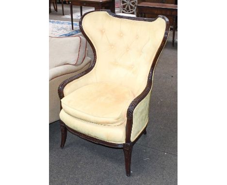 A Button Back Wing Chair, with carved and reeded mahogany frame