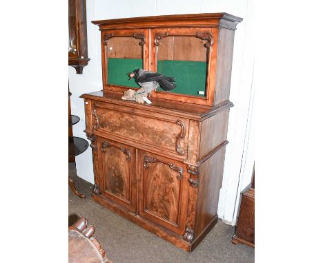 A 19th century Walnut Secretaire Bookcase, the small glazed two door upper section, with adjustable shelf on a secretaire low