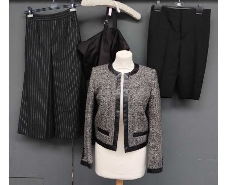 Saint Laurent Ladies Clothing, comprising a black and white wool boucle jacket with black leather trim to the round neck, hem