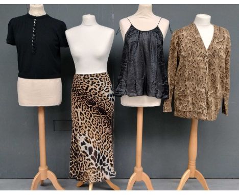 Saint Laurent Ladies Costume, comprising a wool blend leopard print knitted cardigan, with front patch pockets, covered butto