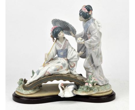 Lladro, Springtime in Japan, boxedCondition Report:  Flower to base of bridge has become detached but is with the item, tip o
