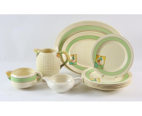 CLARICE CLIFF, a Bizarre part service consisting of milk jug, small plate, four bowls large plat and two oval platters. A jug