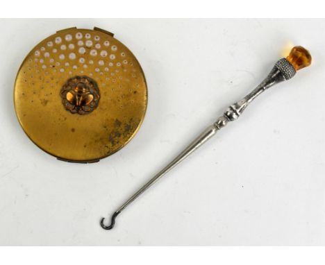 Silver thistle button hook and a Yardley compact Sold on behalf of Oxfam
