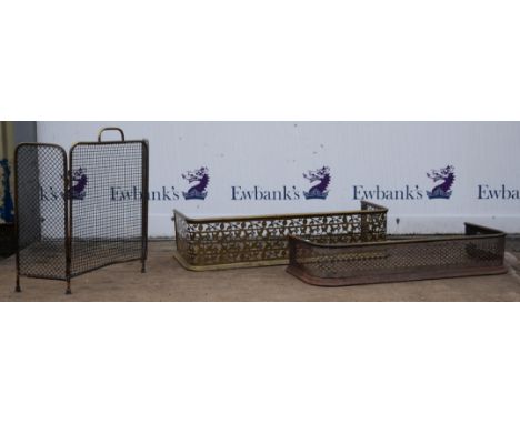 Two pierced brass fenders, 19th Century and a three fold brass mesh fire screen (3)