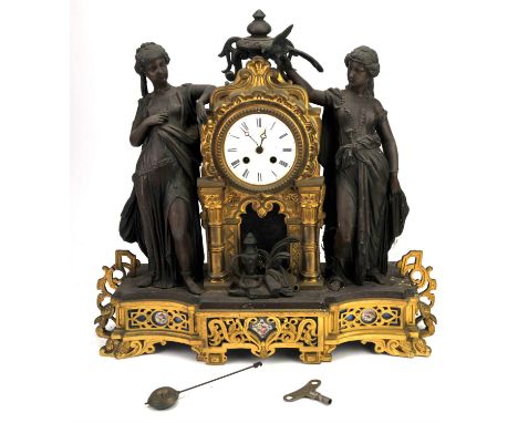 French gilt spelter and Sevres style porcelain Gothic taste clock, 19th Century, with two female figural mounts, flanking an 